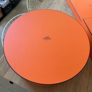 New Hermes gift box, round with ribbon and dust bag. 18” diameter